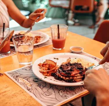 Woman having dinner in a restaurant