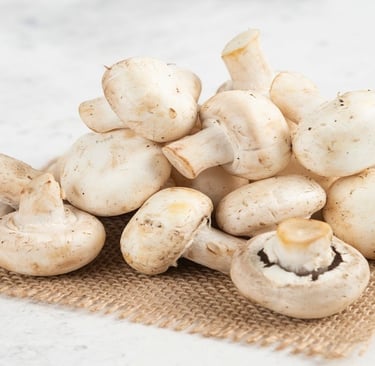 White Mushrooms on a Jute mat
