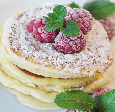 Pancakes with sugar icing and Strawberry