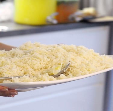 Girl holding rice plate