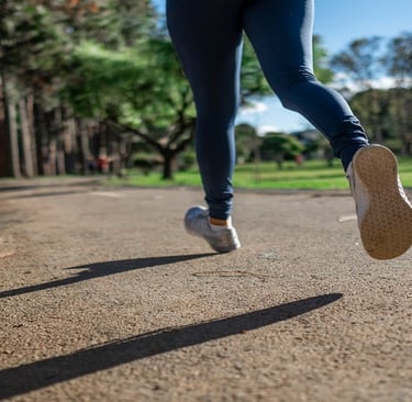 A Girl Running on the Road