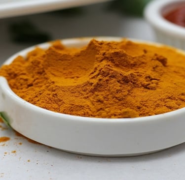 Turmeric powder in a white bowl
