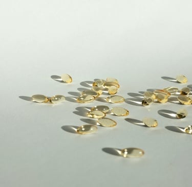 Sunshine falling on capsules on a white surface