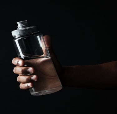 A man holding water bottle