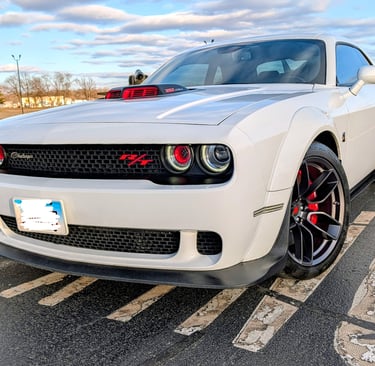 Thanks to John from Illinois for sending pictures of this beautiful car with the vintage red bezels