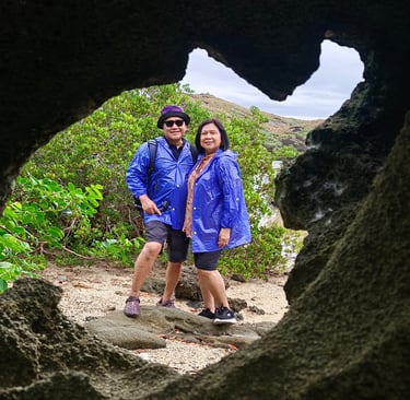 Man and Woman in Biri Island Rock Formation