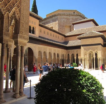 morocco fes a courtyard with a lot of people walking around