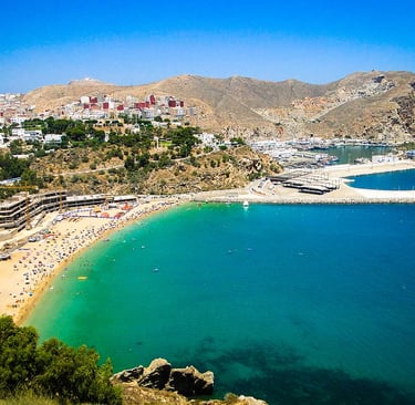 morocco al hoceima a beach with a view of a beach and a mountain