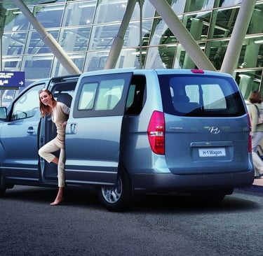 morocco renting car a woman is standing in front of a van