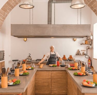 morocco gastronomy a woman in a kitchen with a large archway