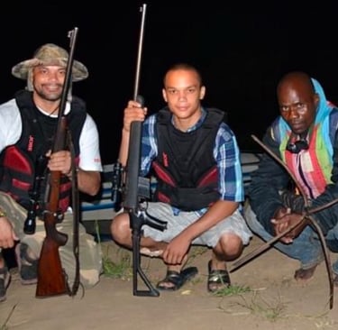 Ian with his son Brennan and Mfumu