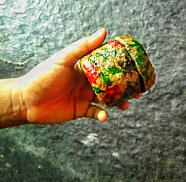 Mini recycled paper trinket box held with hand 