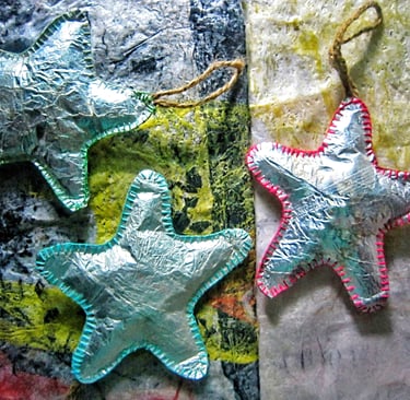 Silver handmade sewing star ornament will be gleaming of your holiday decor 