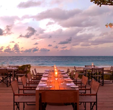 a restaurant with a view of the ocean
