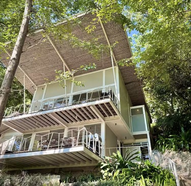 a house with a balcony and a balcony