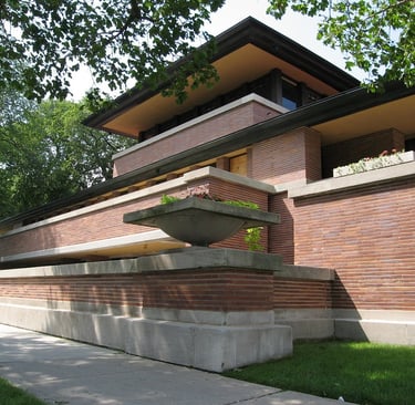 FL wright, a house with a long, narrow, concrete structure