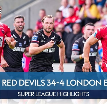 Salford Red Devils and London Broncos - a group of men playing rugby in a stadium