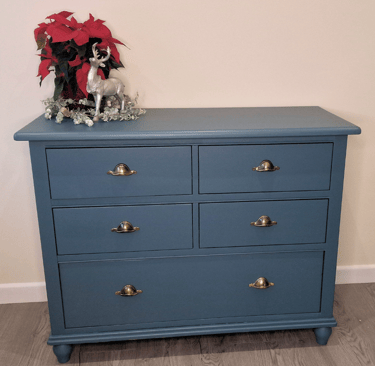 Chest of Drawers painted in a deep teal blue with added cup handles