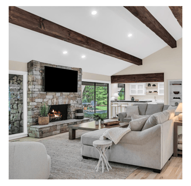 a living room with a couch and a fireplace