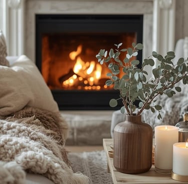 a living room with a fireplace,  candles, and some touch of green from outside of your home