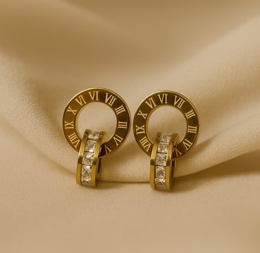 a pair of gold toned roman numerals with roman numerals