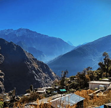 Mountain village with scattered houses