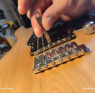 Réglage de l'action des cordes