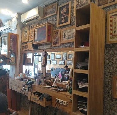 interior design made by DharmaJaya in buleleng a man in a barbershop with a haircut
