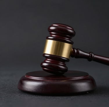 a wooden judge's hammer on top of a table