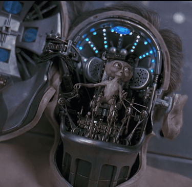 Men in Black alien brain controller, symbolizing the concept of the human brain as an independent entity or flesh mech pilot