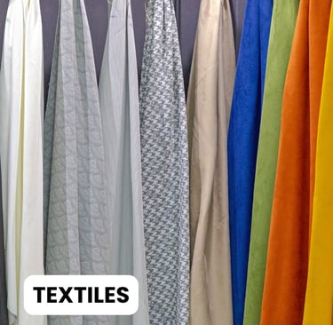 TEXTILES: a variety of different colored fabrics for sample display
