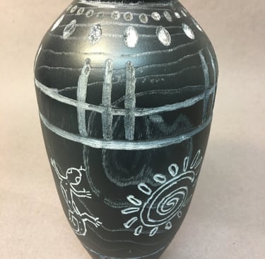 Hand carved black vase with gray markings