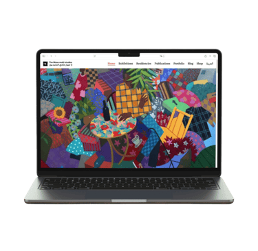 a laptop computer screen displaying a picture of a colorful painting as the hero section