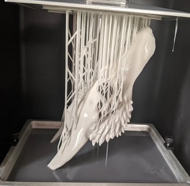 Raw resin BJD parts on supports, demonstrating professional-grade fabrication standards.