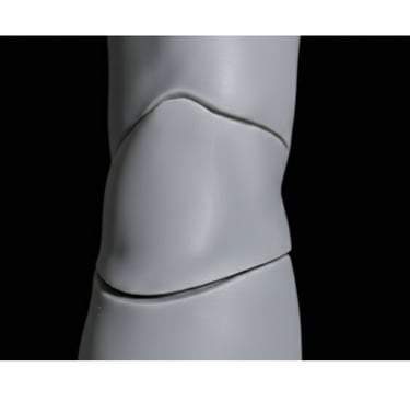 Ball jointed doll resin prototype with dental-grade surface finish.