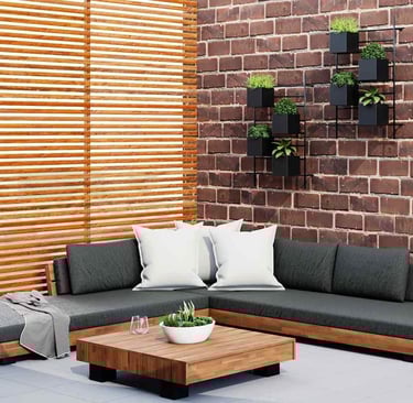 Beautiful concrete patio with a border of decorative pebbles. Custom Concrete Texas