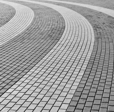 gray and dark gray pattern stamped concrete pathway