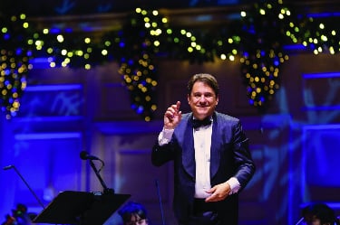 A picture of the conductor of the Boston Symphony Orchestra