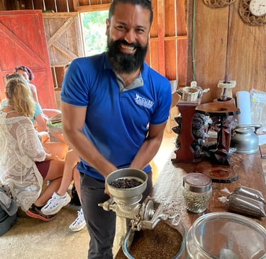 a man with a beard in a blue shirt