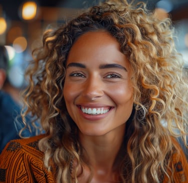 a woman with curly hair and a man in a suit
