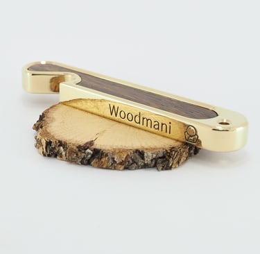 bottle opener made from brass and exotic wood