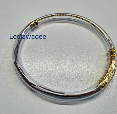 gros plan du bracelet kru tao long silver gold