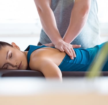 a woman is shown getting a therapeutic massage