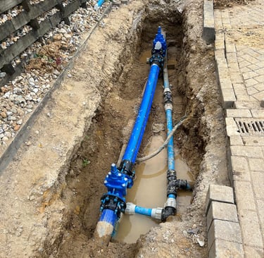 Fixing a water leak with a new pipe 
