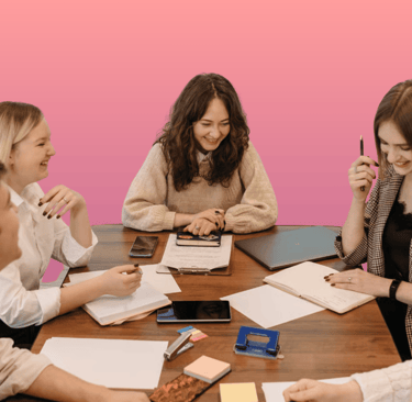 a group of people sitting around a table