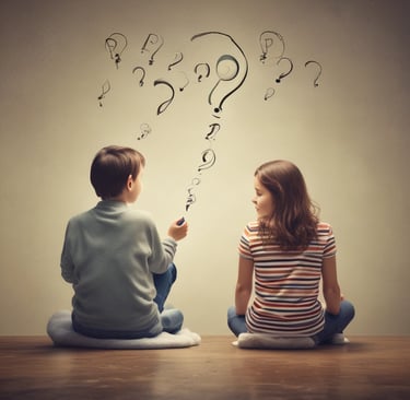 a boy and girl sitting on a floor with question marks