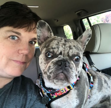 heather and Ruby taking a ride in the car
