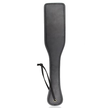 a faux leather paddle for bdsm play
