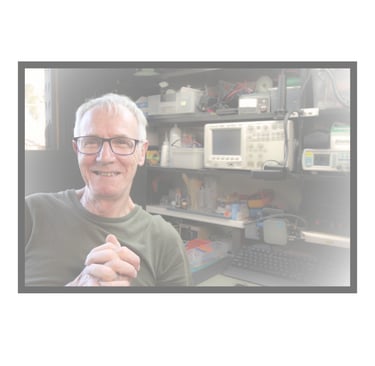 Image of technician in camera repair workshop