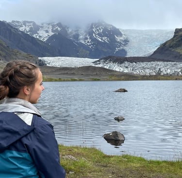A photo in front of a glacier in Iceland- I LOVE to travel!